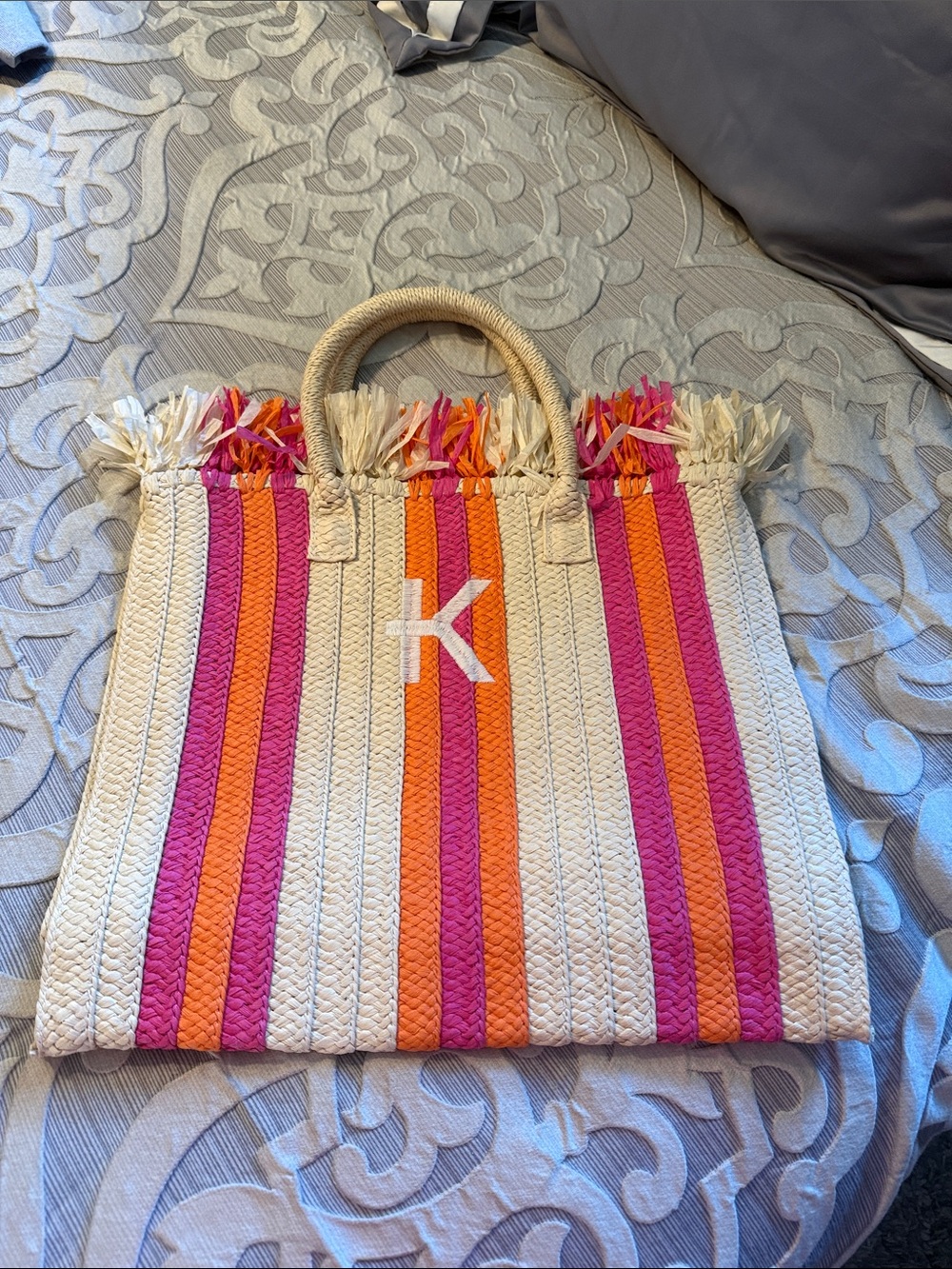 Monogrammed Pink & Orange Stripe Straw Tote - K (Mark & Graham)